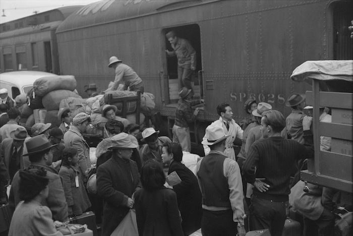  Japanese Americans boarding train bound for internment camp